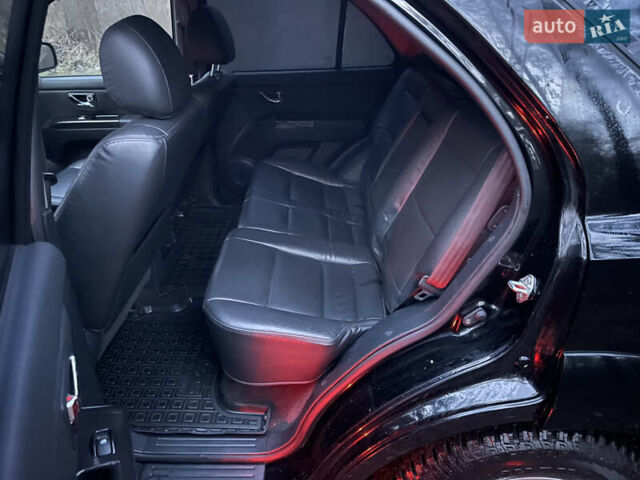 Черный Киа Соренто, объемом двигателя 2.5 л и пробегом 200 тыс. км за 5200 $, фото 11 на Automoto.ua