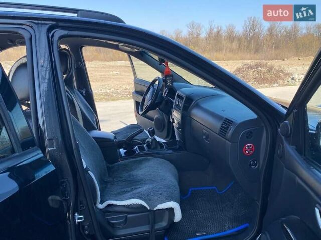 Черный Киа Соренто, объемом двигателя 2.5 л и пробегом 135 тыс. км за 9200 $, фото 3 на Automoto.ua