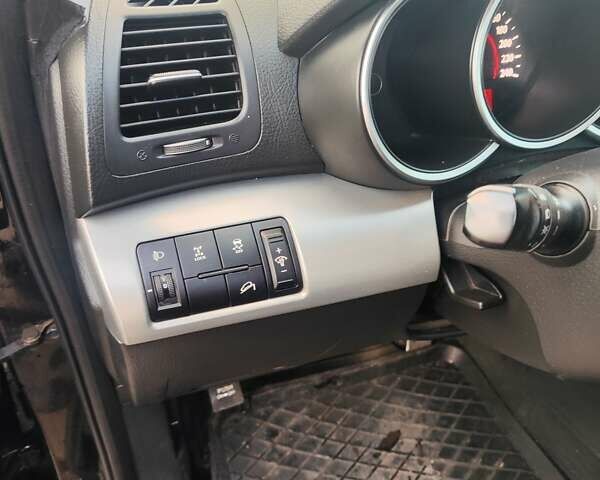 Киа Соренто 2009 в Жашкове на Automoto.ua Черный Киа Соренто, объемом двигателя 2.2 л и пробегом 600 тыс. км за 10000 $, фото 4 на Automoto.ua