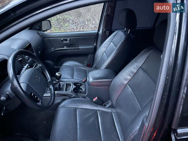 Черный Киа Соренто, объемом двигателя 2.5 л и пробегом 200 тыс. км за 5200 $, фото 10 на Automoto.ua