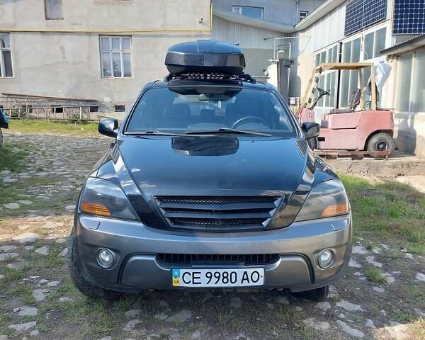 Черный Киа Соренто, объемом двигателя 2.5 л и пробегом 197 тыс. км за 10000 $, фото 1 на Automoto.ua