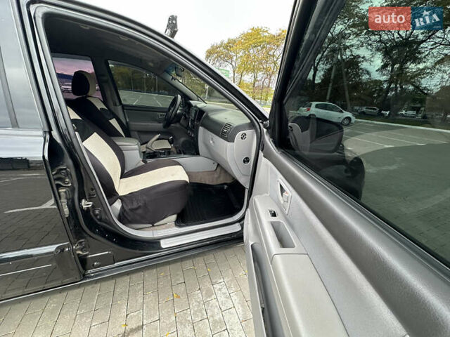 Черный Киа Соренто, объемом двигателя 2.5 л и пробегом 299 тыс. км за 5399 $, фото 29 на Automoto.ua