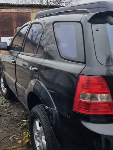 Черный Киа Соренто, объемом двигателя 2.5 л и пробегом 300 тыс. км за 4600 $, фото 8 на Automoto.ua