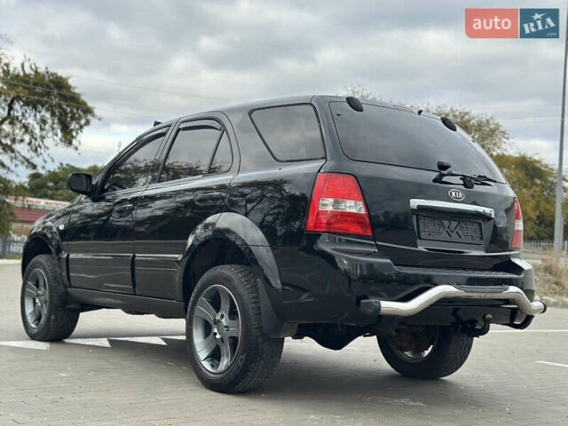 Черный Киа Соренто, объемом двигателя 2.5 л и пробегом 299 тыс. км за 5399 $, фото 1 на Automoto.ua