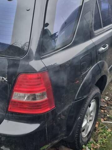 Черный Киа Соренто, объемом двигателя 2.5 л и пробегом 300 тыс. км за 4600 $, фото 10 на Automoto.ua