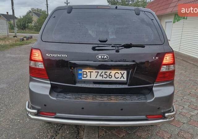Чорний Кіа Соренто, об'ємом двигуна 2.5 л та пробігом 208 тис. км за 7800 $, фото 4 на Automoto.ua