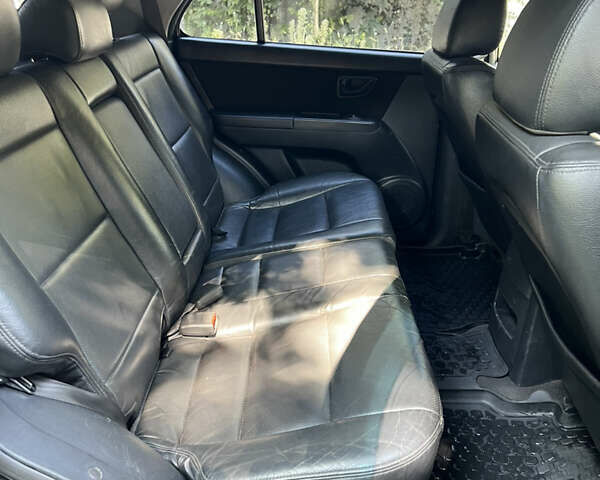 Черный Киа Соренто, объемом двигателя 2.5 л и пробегом 228 тыс. км за 9500 $, фото 21 на Automoto.ua