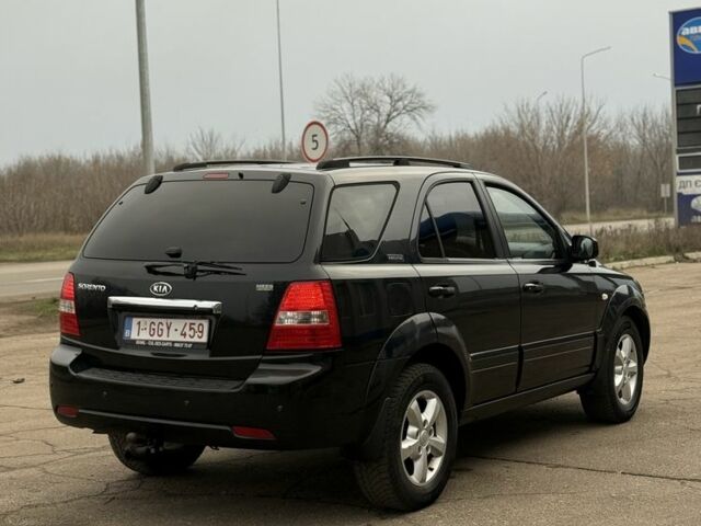 Черный Киа Соренто, объемом двигателя 2.5 л и пробегом 240 тыс. км за 5350 $, фото 3 на Automoto.ua