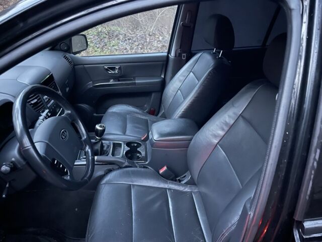 Черный Киа Соренто, объемом двигателя 2.5 л и пробегом 200 тыс. км за 5200 $, фото 10 на Automoto.ua