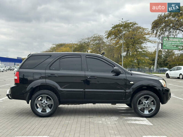 Черный Киа Соренто, объемом двигателя 2.5 л и пробегом 299 тыс. км за 5399 $, фото 11 на Automoto.ua