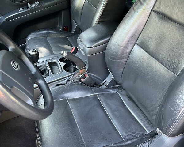 Черный Киа Соренто, объемом двигателя 2.5 л и пробегом 228 тыс. км за 9500 $, фото 19 на Automoto.ua