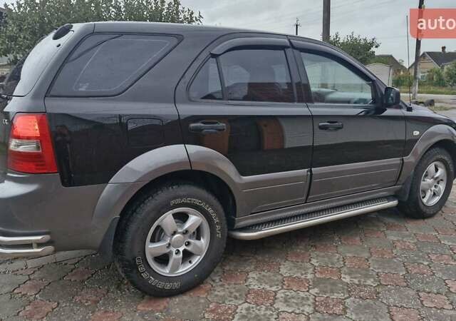 Чорний Кіа Соренто, об'ємом двигуна 2.5 л та пробігом 208 тис. км за 7800 $, фото 1 на Automoto.ua