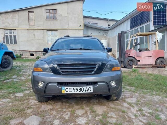 Черный Киа Соренто, объемом двигателя 2.5 л и пробегом 197 тыс. км за 10000 $, фото 6 на Automoto.ua