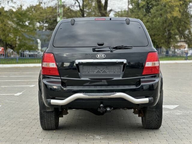 Черный Киа Соренто, объемом двигателя 2.5 л и пробегом 300 тыс. км за 5499 $, фото 6 на Automoto.ua
