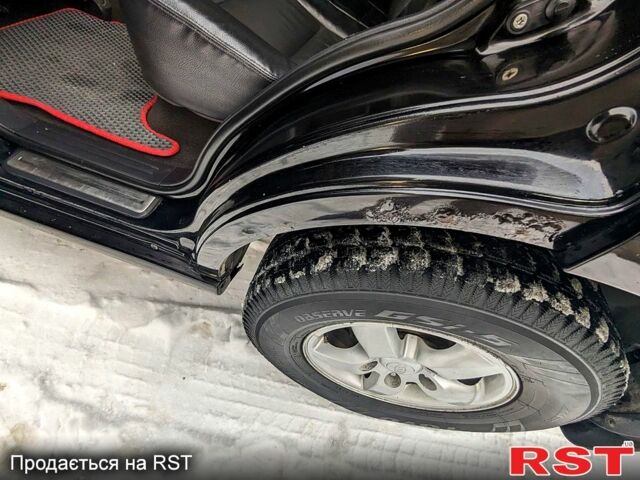 Черный Киа Соренто, объемом двигателя 2.5 л и пробегом 278 тыс. км за 7700 $, фото 6 на Automoto.ua