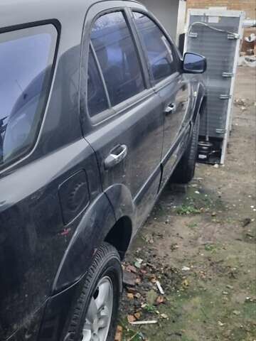 Черный Киа Соренто, объемом двигателя 2.5 л и пробегом 300 тыс. км за 4600 $, фото 11 на Automoto.ua