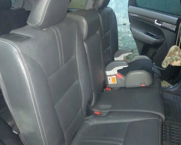 Чорний Кіа Соренто, об'ємом двигуна 2.4 л та пробігом 270 тис. км за 12000 $, фото 14 на Automoto.ua
