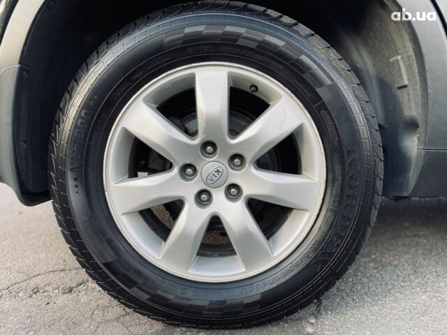 Черный Киа Соренто, объемом двигателя 2.4 л и пробегом 237 тыс. км за 11500 $, фото 19 на Automoto.ua