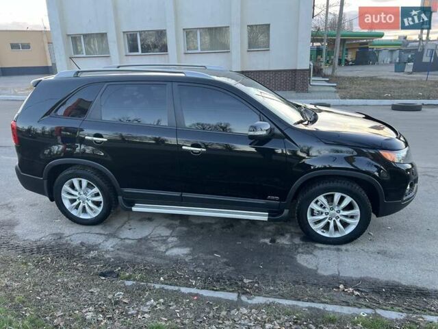 Чорний Кіа Соренто, об'ємом двигуна 2.4 л та пробігом 193 тис. км за 11900 $, фото 3 на Automoto.ua