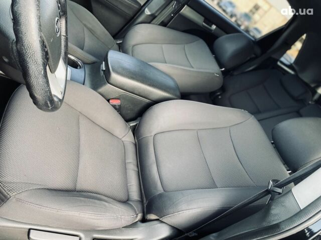 Черный Киа Соренто, объемом двигателя 2.4 л и пробегом 237 тыс. км за 11500 $, фото 12 на Automoto.ua
