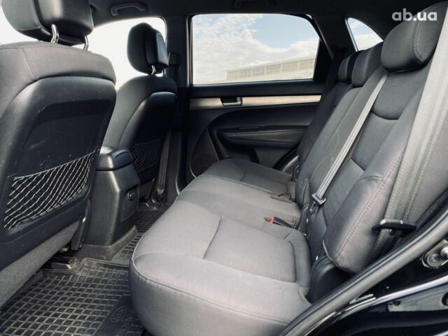 Черный Киа Соренто, объемом двигателя 2.4 л и пробегом 237 тыс. км за 11500 $, фото 16 на Automoto.ua