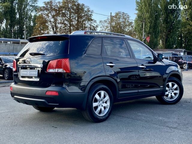 Черный Киа Соренто, объемом двигателя 2.4 л и пробегом 237 тыс. км за 11500 $, фото 4 на Automoto.ua