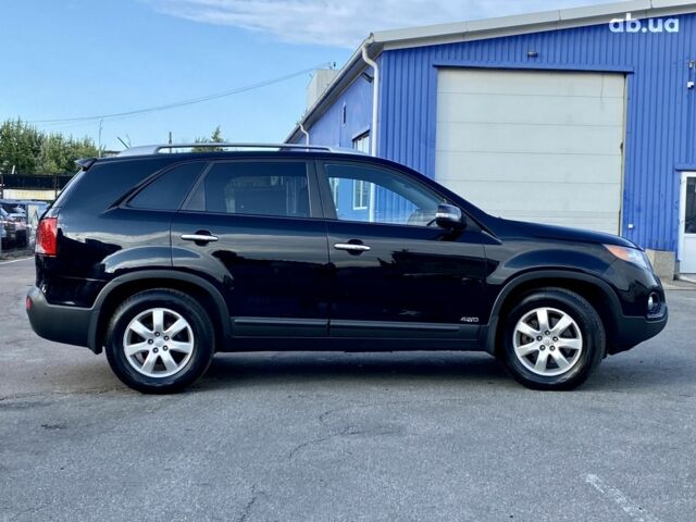 Черный Киа Соренто, объемом двигателя 2.4 л и пробегом 237 тыс. км за 11500 $, фото 3 на Automoto.ua