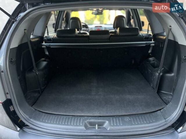 Черный Киа Соренто, объемом двигателя 2.4 л и пробегом 186 тыс. км за 13800 $, фото 33 на Automoto.ua