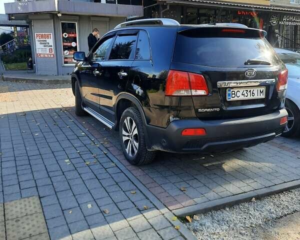 Чорний Кіа Соренто, об'ємом двигуна 2.36 л та пробігом 250 тис. км за 11000 $, фото 3 на Automoto.ua