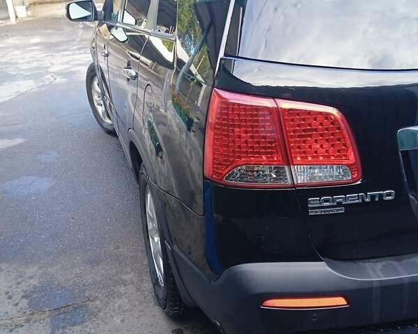 Чорний Кіа Соренто, об'ємом двигуна 2.4 л та пробігом 172 тис. км за 11000 $, фото 4 на Automoto.ua