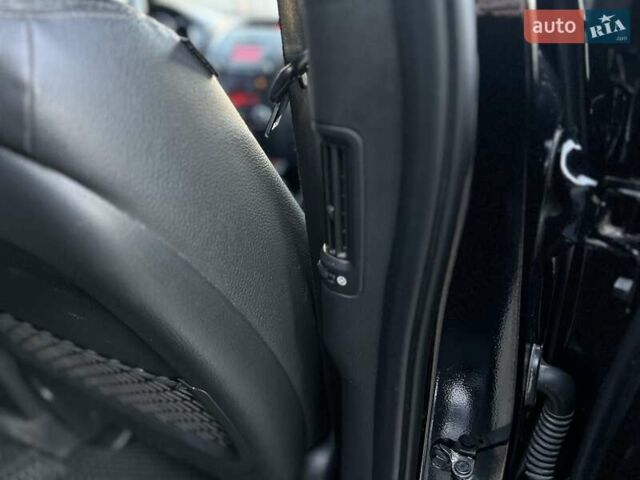 Черный Киа Соренто, объемом двигателя 2.4 л и пробегом 186 тыс. км за 13800 $, фото 25 на Automoto.ua
