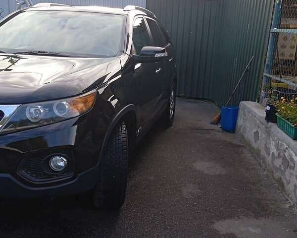 Чорний Кіа Соренто, об'ємом двигуна 2.4 л та пробігом 172 тис. км за 11000 $, фото 5 на Automoto.ua