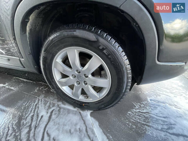 Черный Киа Соренто, объемом двигателя 2.4 л и пробегом 100 тыс. км за 11500 $, фото 12 на Automoto.ua