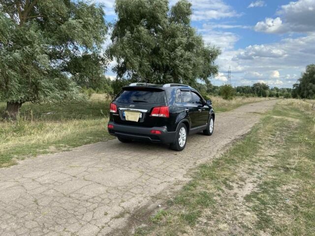 Черный Киа Соренто, объемом двигателя 2.4 л и пробегом 195 тыс. км за 11700 $, фото 2 на Automoto.ua