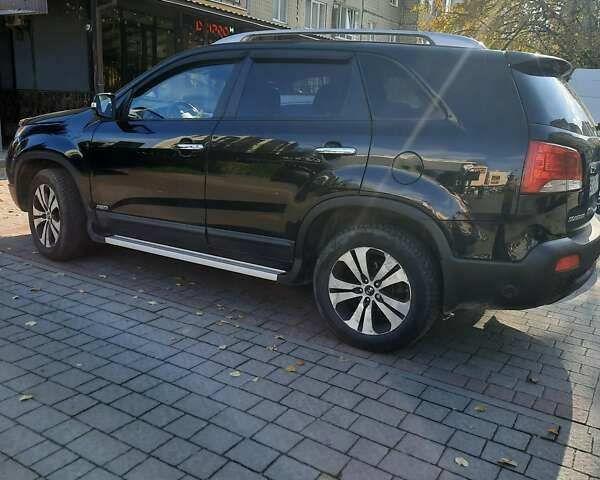 Чорний Кіа Соренто, об'ємом двигуна 2.36 л та пробігом 250 тис. км за 11000 $, фото 1 на Automoto.ua