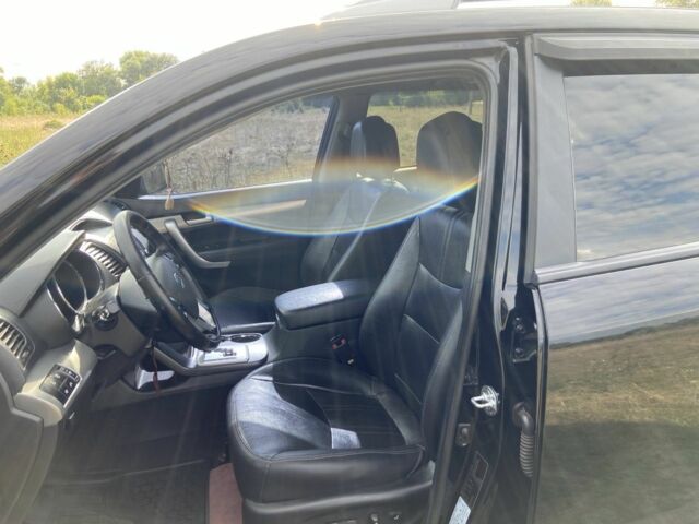 Черный Киа Соренто, объемом двигателя 2.4 л и пробегом 195 тыс. км за 11700 $, фото 5 на Automoto.ua