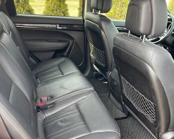 Черный Киа Соренто, объемом двигателя 2.4 л и пробегом 210 тыс. км за 12500 $, фото 8 на Automoto.ua
