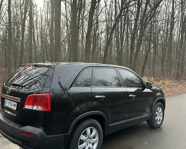 Черный Киа Соренто, объемом двигателя 2.36 л и пробегом 218 тыс. км за 12500 $, фото 4 на Automoto.ua