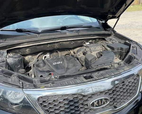 Черный Киа Соренто, объемом двигателя 2.4 л и пробегом 210 тыс. км за 12500 $, фото 5 на Automoto.ua