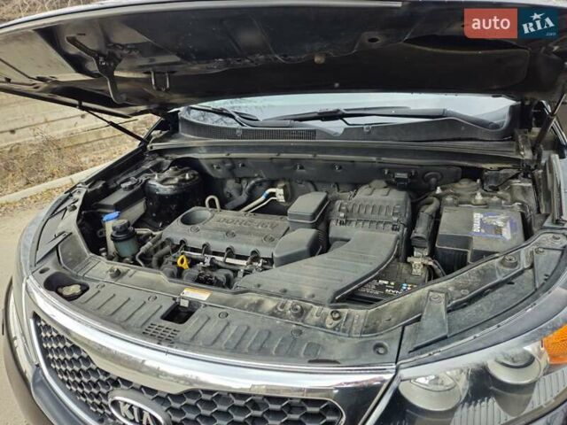 Черный Киа Соренто, объемом двигателя 2.4 л и пробегом 225 тыс. км за 13000 $, фото 11 на Automoto.ua