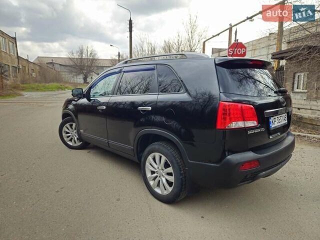 Черный Киа Соренто, объемом двигателя 2.4 л и пробегом 225 тыс. км за 13000 $, фото 5 на Automoto.ua