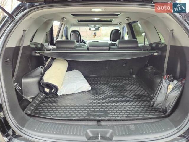 Черный Киа Соренто, объемом двигателя 2.4 л и пробегом 225 тыс. км за 13000 $, фото 12 на Automoto.ua