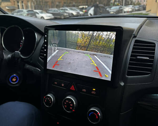 Чорний Кіа Соренто, об'ємом двигуна 2.36 л та пробігом 249 тис. км за 9300 $, фото 11 на Automoto.ua