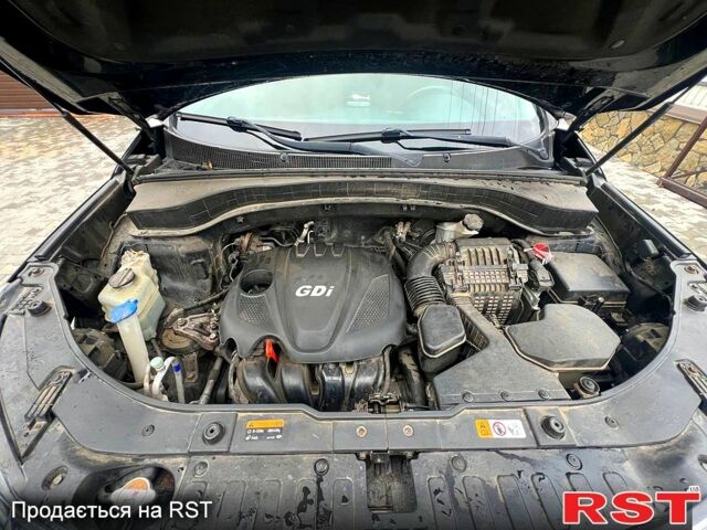 Черный Киа Соренто, объемом двигателя 2.4 л и пробегом 265 тыс. км за 12000 $, фото 4 на Automoto.ua