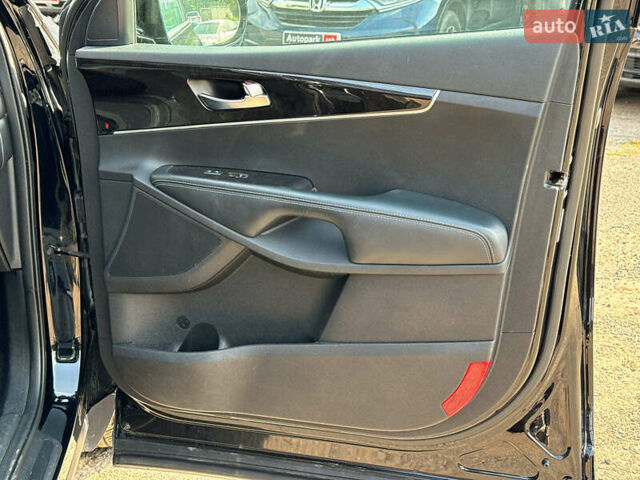 Черный Киа Соренто, объемом двигателя 2.4 л и пробегом 122 тыс. км за 20490 $, фото 22 на Automoto.ua
