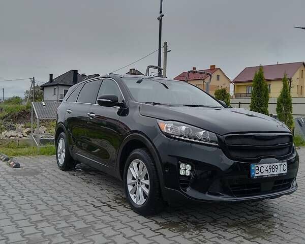 Черный Киа Соренто, объемом двигателя 2.4 л и пробегом 55 тыс. км за 15700 $, фото 2 на Automoto.ua