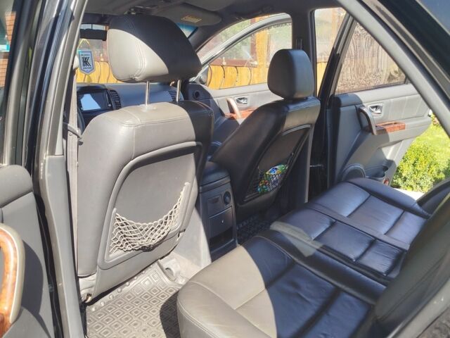 Чорний Кіа Соренто, об'ємом двигуна 2.4 л та пробігом 300 тис. км за 7300 $, фото 4 на Automoto.ua