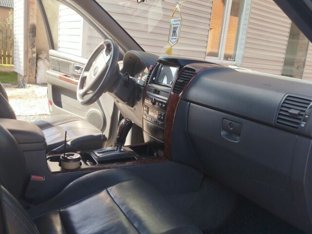 Чорний Кіа Соренто, об'ємом двигуна 2.4 л та пробігом 300 тис. км за 7300 $, фото 6 на Automoto.ua