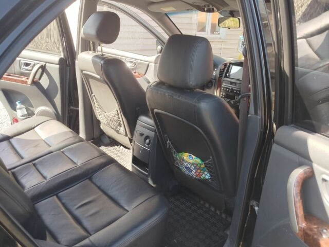 Чорний Кіа Соренто, об'ємом двигуна 2.4 л та пробігом 300 тис. км за 7300 $, фото 3 на Automoto.ua