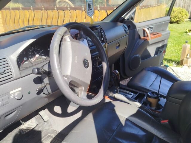 Чорний Кіа Соренто, об'ємом двигуна 2.4 л та пробігом 300 тис. км за 7300 $, фото 5 на Automoto.ua